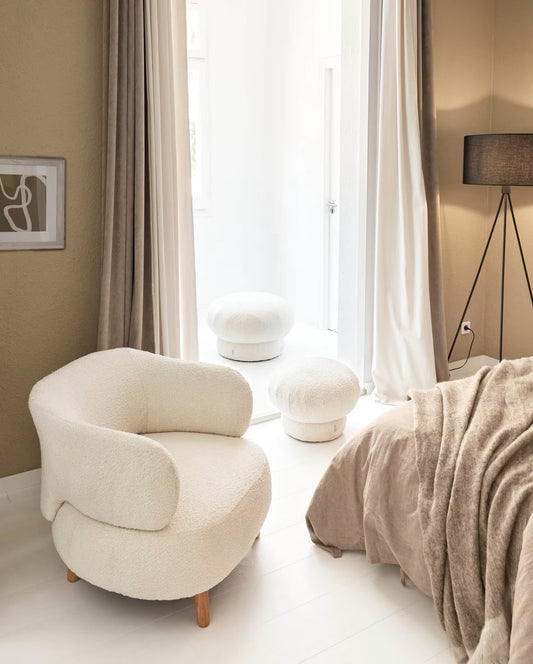 Luisa white bouclé armchair with solid rubber wood legs.