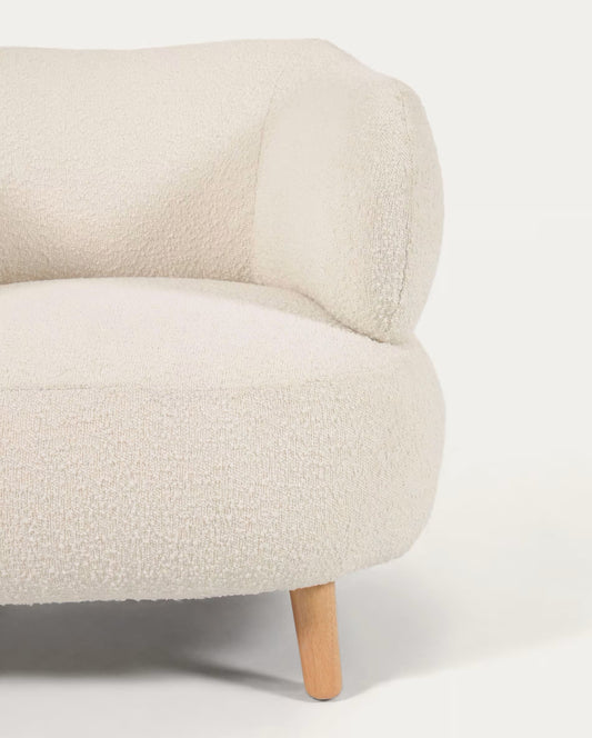 Luisa white bouclé armchair with solid rubber wood legs.
