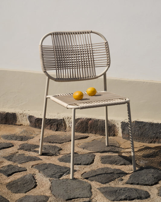 Talaier stackable outdoor chair  made of synthetic rope and galvanized steel in beige finish