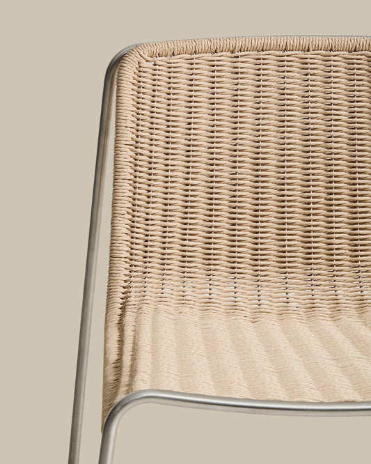 Tavari stackable chair in beige synthetic rope cord and AISI 304 stainless steel with brushed finish