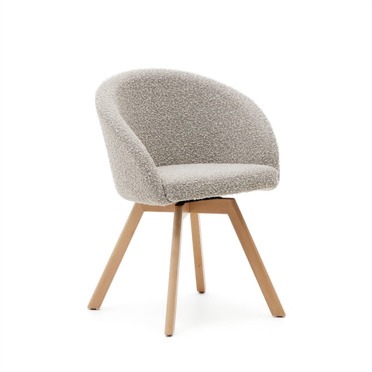 Marvin swivel chair with grey bouclé and beech wood legs in a natural finish FSC 100%