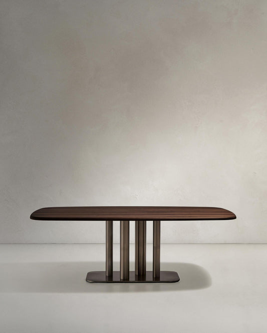 Melvar table made from walnut veneer and legs with brushed stainless steel base 180 x 100cm