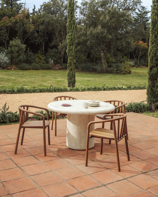 Drasi round concrete table with travertine-effect finish Ø122cm