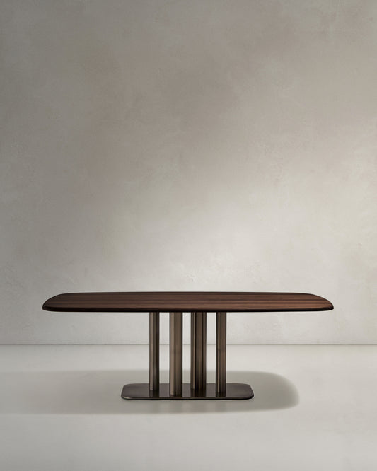 Melvar table made from walnut veneer and legs with brushed stainless steel base 220 x 110cm